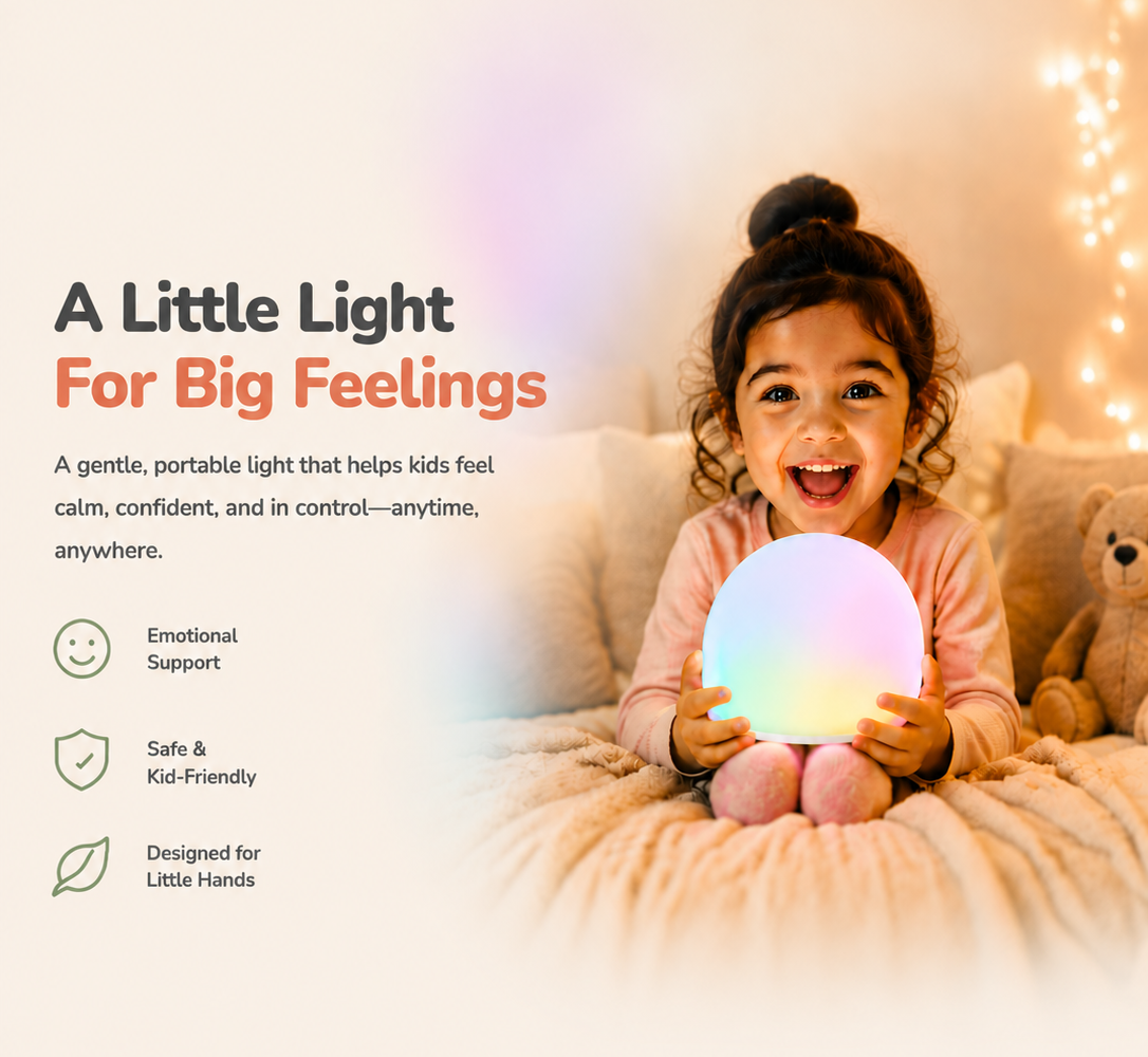 A young child sitting on a bed holds a glowing round portable light WattBubble that casts a soft rainbow of light. The scene is warmly lit with string lights in the background, and marketing text on the left reads 'A Little Light For Big Feelings' with feature bullet points.