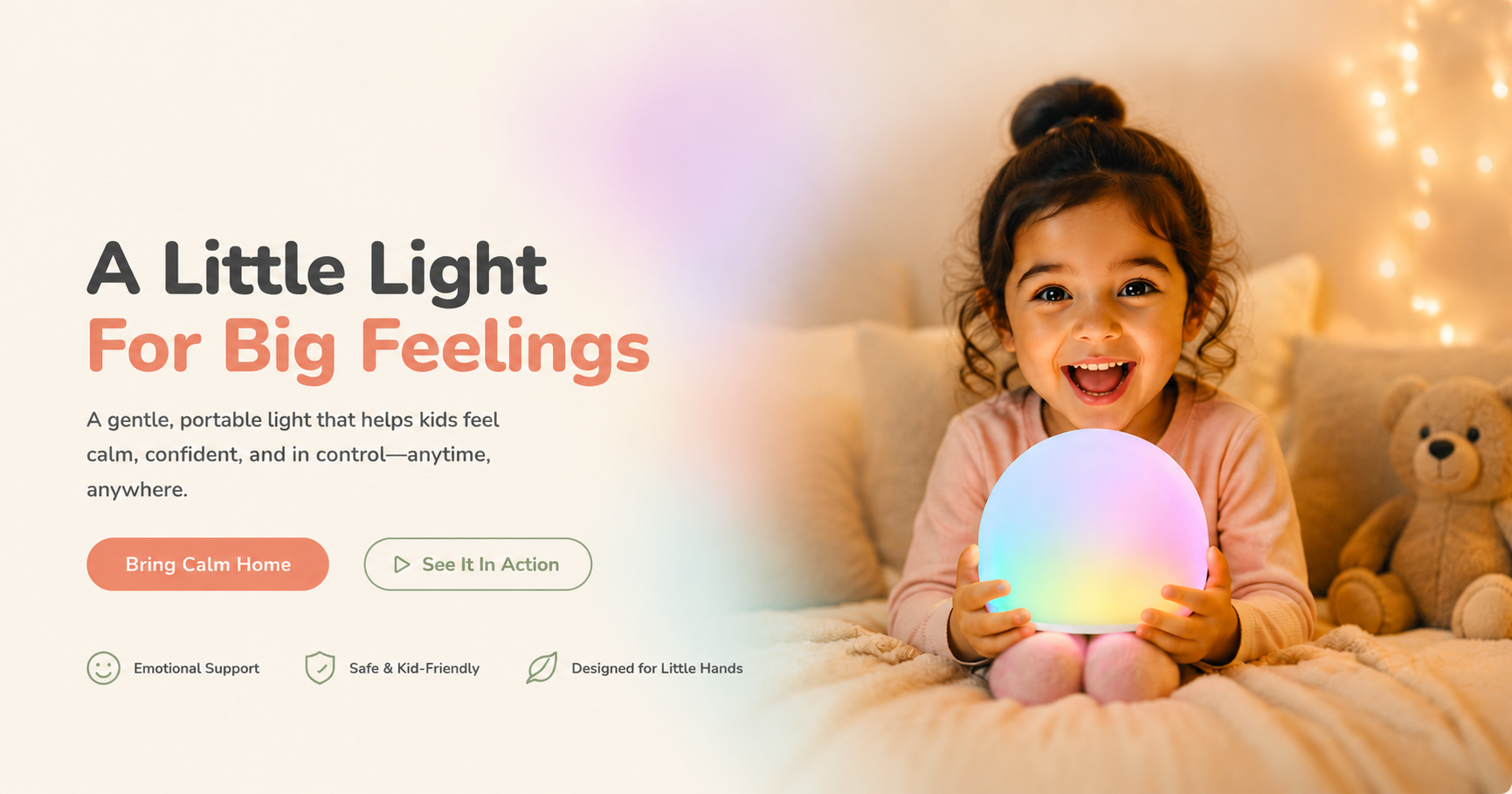 A smiling young girl sits on a bed holding a glowing round portable light that shifts through pastel rainbow colors. The scene is warmly lit with string lights in the background, and marketing text on the left reads 'A Little Light For Big Feelings' with feature callouts including emotional support, safe and kid-friendly, and designed for little hands.